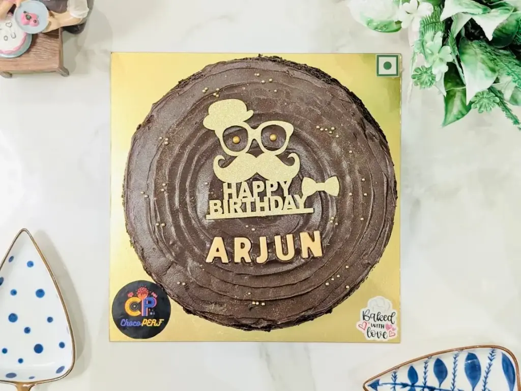 Naked Chocolate Cake Topped With Silky Ganache