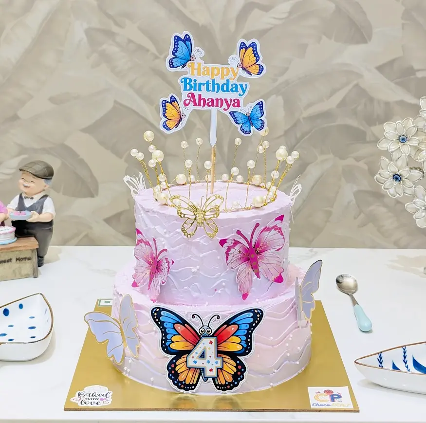 Butterfly Themed Pineapple & Kesar Pista 2-Tier Cake [2Kg]